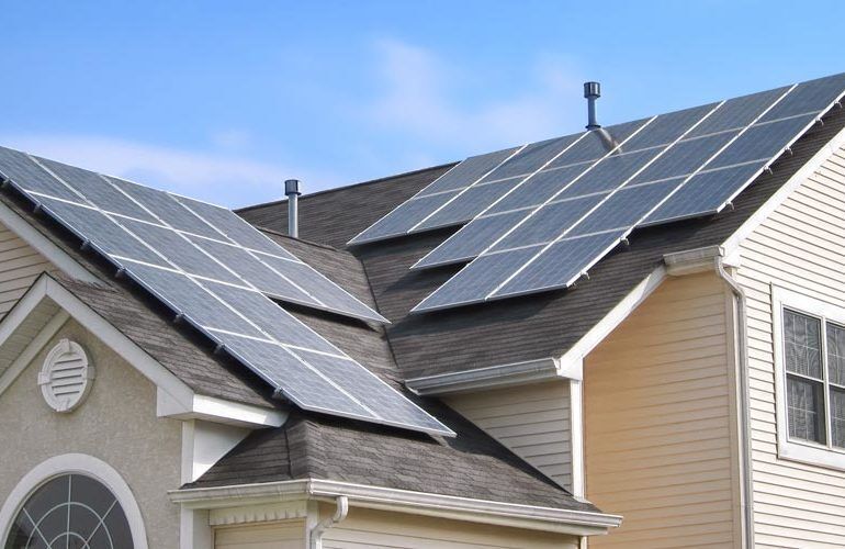 ouse with solar panels on the roof, showcasing solar power and energy, home solar system, and house solar power system.